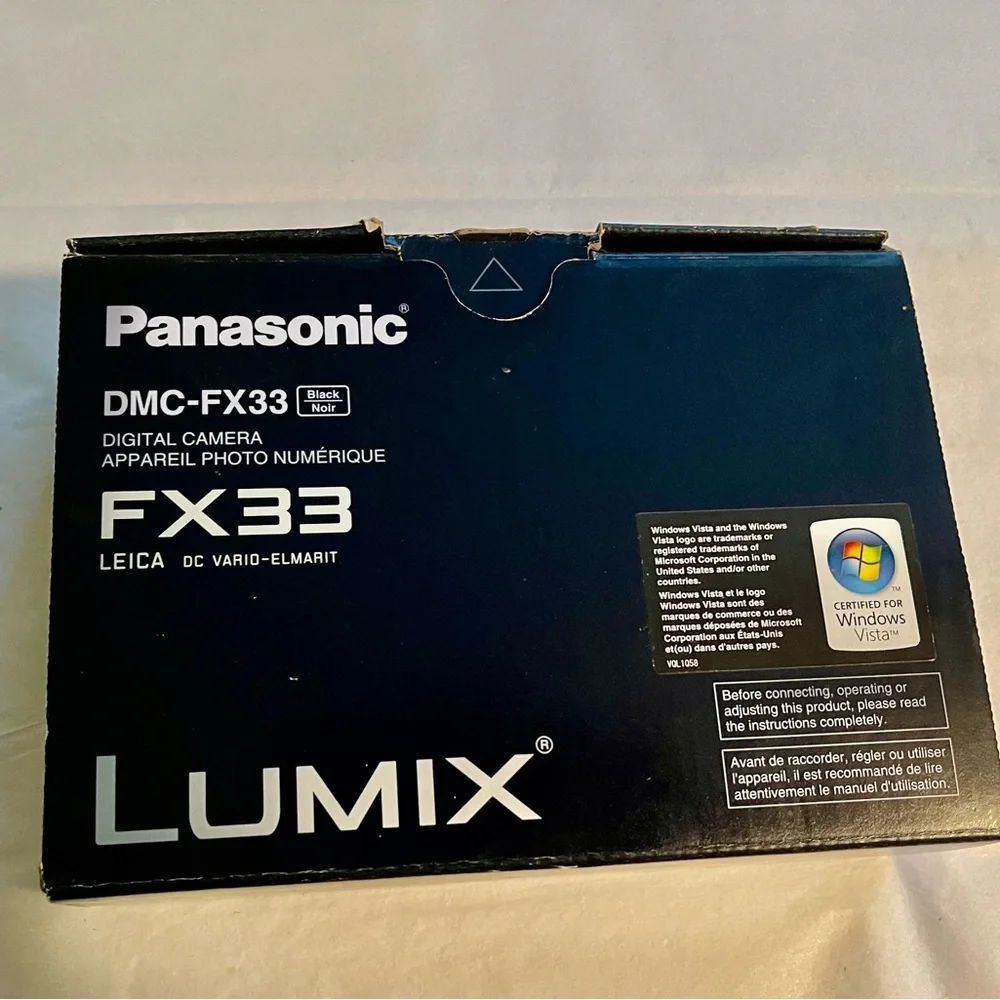 NIB! Leica Lens Panasonic Lumix FX33 DMC Silver Black Digital Camera